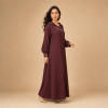 Back view of a burgundy Moroccan djellaba with a pointed hood, gathered sleeves and decorated cuffs