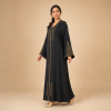 Back view of a black Moroccan djellaba with a pointed hood and triangular copper and teal sleeve panels