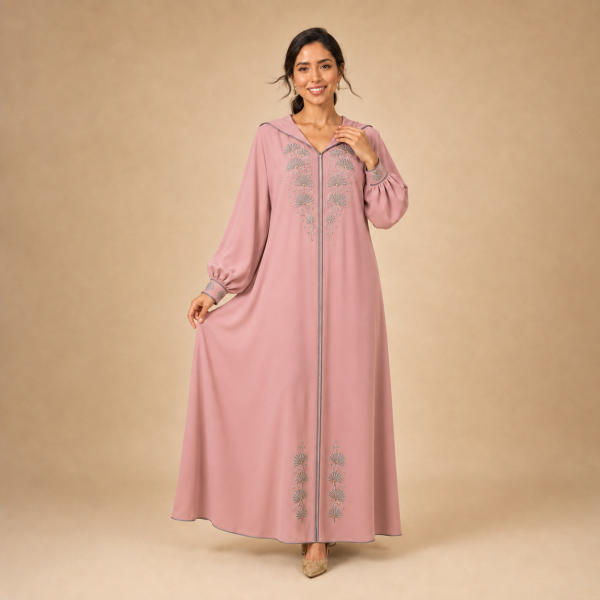 Front view of a dusty pink Moroccan djellaba with silver-grey fan leaf motifs and gathered sleeves