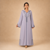 Front view of a lavender Moroccan djellaba with navy arch detailing and split sleeve openings
