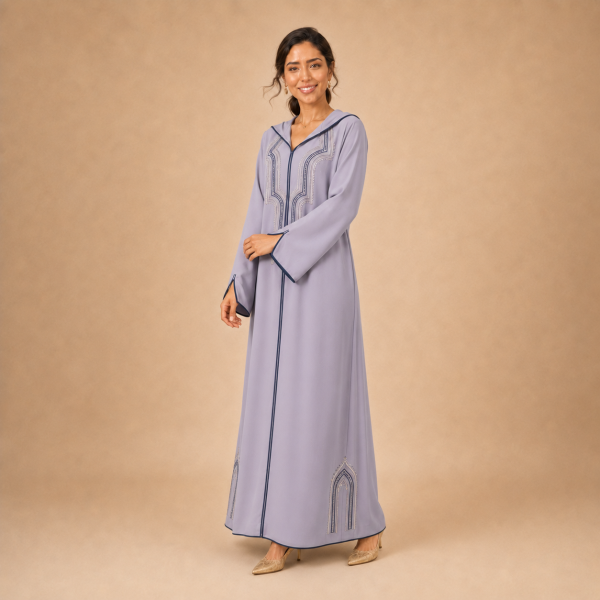 Back view of a lavender Moroccan djellaba with a pointed hood, navy edging and split sleeve ends