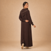 Back view of a chocolate-brown Moroccan djellaba with a pointed hood, beige edging and decorated fitted cuffs