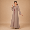 Back view of a warm taupe Moroccan djellaba with a pointed hood, burgundy edging and embroidered sleeve openings