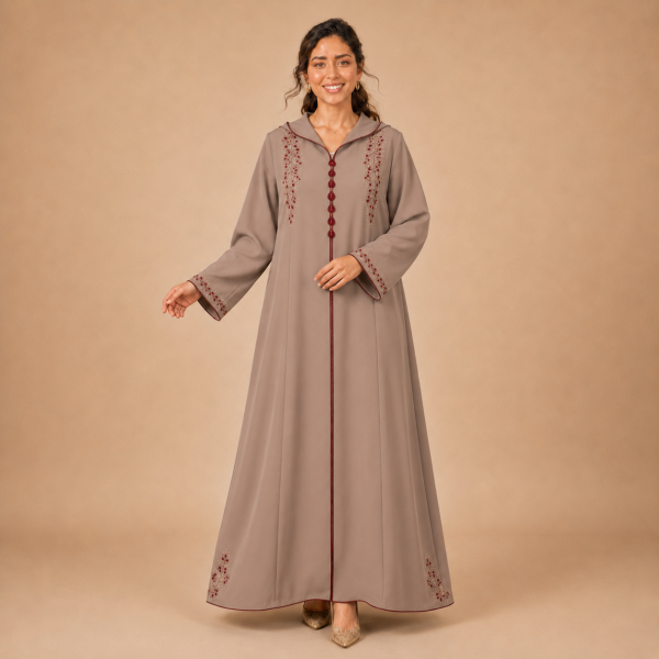 Back view of a warm taupe Moroccan djellaba with a pointed hood, burgundy edging and embroidered sleeve openings