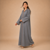 Back view of a blue-grey striped Moroccan djellaba with a pointed hood and broad directional-stripe cuffs