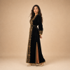 26 Back view of a black Moroccan caftan with gold geometric details, wide cuffs and bronze side panels
