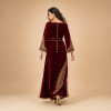 Back view of a burgundy Moroccan caftan with decorated sleeves, gold motifs and contrasting side panels