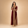 Back view of a burgundy Moroccan caftan with decorated sleeves, gold motifs and contrasting side panels