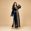 Back view of a navy blue Moroccan caftan with gold cuff details and champagne side panels