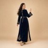 Back view of a navy blue Moroccan caftan with gold cuff details and champagne side panels