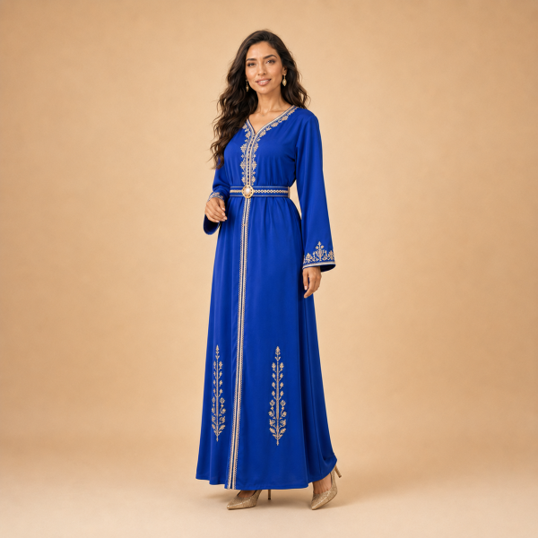 58 Back view of a royal blue Moroccan caftan with gold botanical motifs on the lower skirt and decorated cuffs