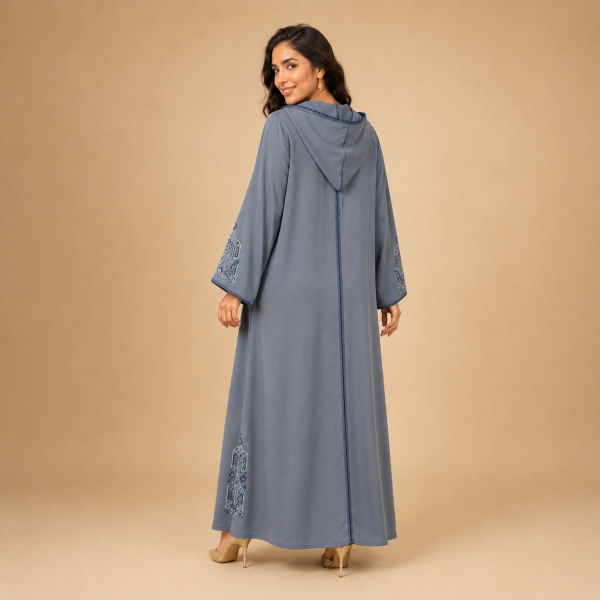 68 Back view of a slate grey Moroccan djellaba with a pointed hood, blue centre trim and geometric sleeve details